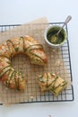 Brioche almond topped and glazed with matcha chocolate