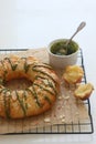 Brioche topped with almonds and glazed with matcha chocolate