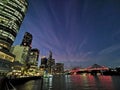 BRISBANE, AUSTRALIA - JULY 10, 2020: Twilight defocused blurred abstract scene of famous Story Bridge and Eagle Street pier in