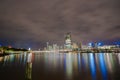 Brisbane city skyline lights across river at night from South Ba Royalty Free Stock Photo