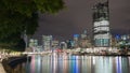 Brisbane city skyline lights across river at night from South Ba Royalty Free Stock Photo