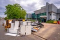 Brisbane, Queensland, Australia - Mar 4, 2022: Flood damaged office furniture dumped on the side of the road for collection Royalty Free Stock Photo