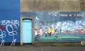 Narrow street with colorful graffiti in Eastville district in Bristol city Royalty Free Stock Photo