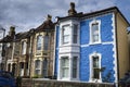 Narrow street with colorful houses in Eastville neighborhood in Bristol city Royalty Free Stock Photo