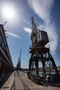 Bristol England UK cranes along the dockside at Princes Wharf