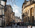 Bristol, UK - February 12 2020: Early shoppers make their way along Corn Street