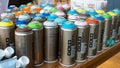 Bristol, UK - February 12 2020: A group of Montana Gold spray paint cans in a range of colours for sale in the Cass art shop