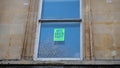 Bristol, UK - February 12 2020: A paper flyer in a window in Bristol city centre reads Vote Green Party