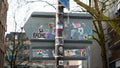 Bristol, UK - February 12 2020: Sticker bombed street sign covered with stickers and tags