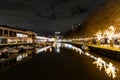 Bristol, UK - January 30, 2024: The Watershed in Bristol Harbour at night with many restaurants bars and canal boats