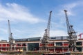 View of Electric Cranes by the River Avon in Bristol on May 13, 2019. Unidentified people Royalty Free Stock Photo