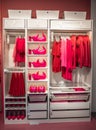 Bristol, UK - September 15, 2023: Ikea wardrobe obsessed with pink clothes arranged on hangers and shelf