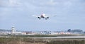 A British Airways Airbus A319-131 callsign G-DBCA comes into land at Gatwick Airport over many grounded aeroplanes due to Covid-19