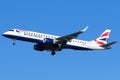 a british airlines plane flying in the sky in clear skies