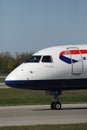 British Airways plane taxiing on taxiway, close-up view