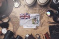 British Antarctic Territory Flag Between Traveler`s Accessories on Old Vintage Map. Overhead Shot