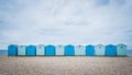 British blue beach houses near Charmouth in Dorset, UK