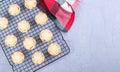 British Christmas mince pies or tarts with fruit filling, on cooling rack, horizontal, top view Royalty Free Stock Photo