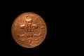 British coin 2 pence 2001 isolated on black background with space for copy text. Front side of two pence coin. England coins