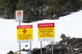 View of sign on Trans-Canada Highway `Danger. Avalanche Control using Explosives.