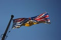 British Columbia provincial flag flying in the wind from a flagpole Royalty Free Stock Photo