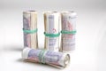 British currency. Four rolls of twenty pound notes held by rubber band Royalty Free Stock Photo