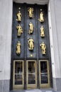 British Empire Building Golden bas relief depicting the types of trades