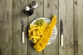 British Fish and Chips on a newspaper print plate Royalty Free Stock Photo