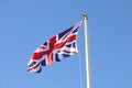 British flag on a sunny blue day Royalty Free Stock Photo