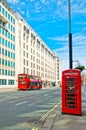 British icons red phone booth and red bus in London Royalty Free Stock Photo