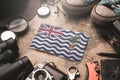 British Indian Ocean Territory Flag Between Traveler`s Accessories on Old Vintage Map. Tourist Destination Concept Royalty Free Stock Photo