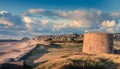 British Lewis Tower with german defence in the background, Saint Quen, bailiwick of Jersey, Channel Islands Royalty Free Stock Photo