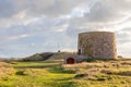 British Lewis Tower with nazi bunker in the background, Saint Quen, bailiwick of Jersey, Channel Islands