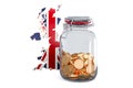 British map with glass jar full of golden coins, 3D rendering Royalty Free Stock Photo