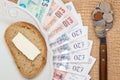 British money on kitchen table, coast of living Royalty Free Stock Photo