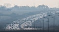 British motorway in a rush hours, in a foggy afternoon Royalty Free Stock Photo