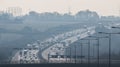 British motorway in a rush hours, in a foggy afternoon