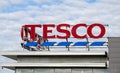 Tesco supermarket sign. Brand logo. Tesco banner at a building exterior. Royalty Free Stock Photo