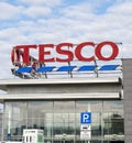 Tesco supermarket sign. Brand logo. Tesco banner at a building exterior. Royalty Free Stock Photo