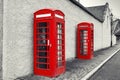 British Old red phone booth, monochrome image, UK