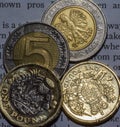 2 British One Pound Coin and 10 Zloty in two Five Zloty Coin B Royalty Free Stock Photo