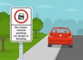 British outdoor parking rules. Close-up view of a `No motor vehicle parking on verge or footway` sign. Royalty Free Stock Photo