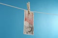 British Paper Currency On Clothesline Royalty Free Stock Photo