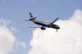 British passenger jet on landing approach Royalty Free Stock Photo