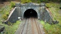 A passenger train passes through the Totley tunnel in the Peak District during May - Sunny overcast day