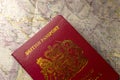 British passport on a paper map Royalty Free Stock Photo