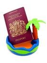 A British passport on a toy beach. Royalty Free Stock Photo