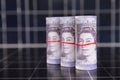 British pound banknotes on solar panels background Royalty Free Stock Photo