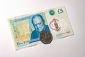 British pound coin on British pound banknotes Royalty Free Stock Photo