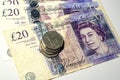 British pound coin on British pound banknotes Royalty Free Stock Photo